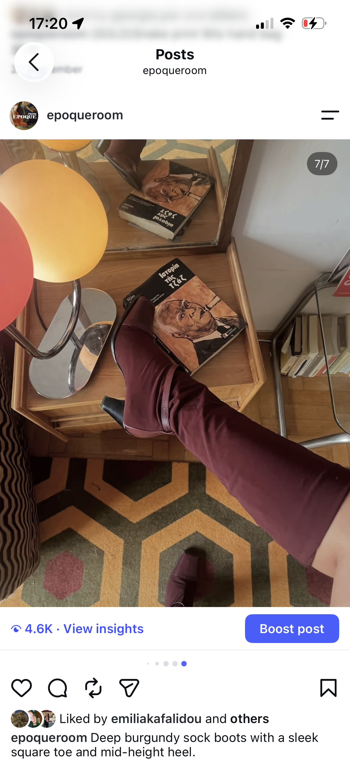 Deep burgundy sock boots with a sleek square toe and mid-height heel.