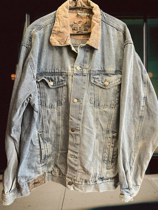Vintage denim jacket with corduroy collar .