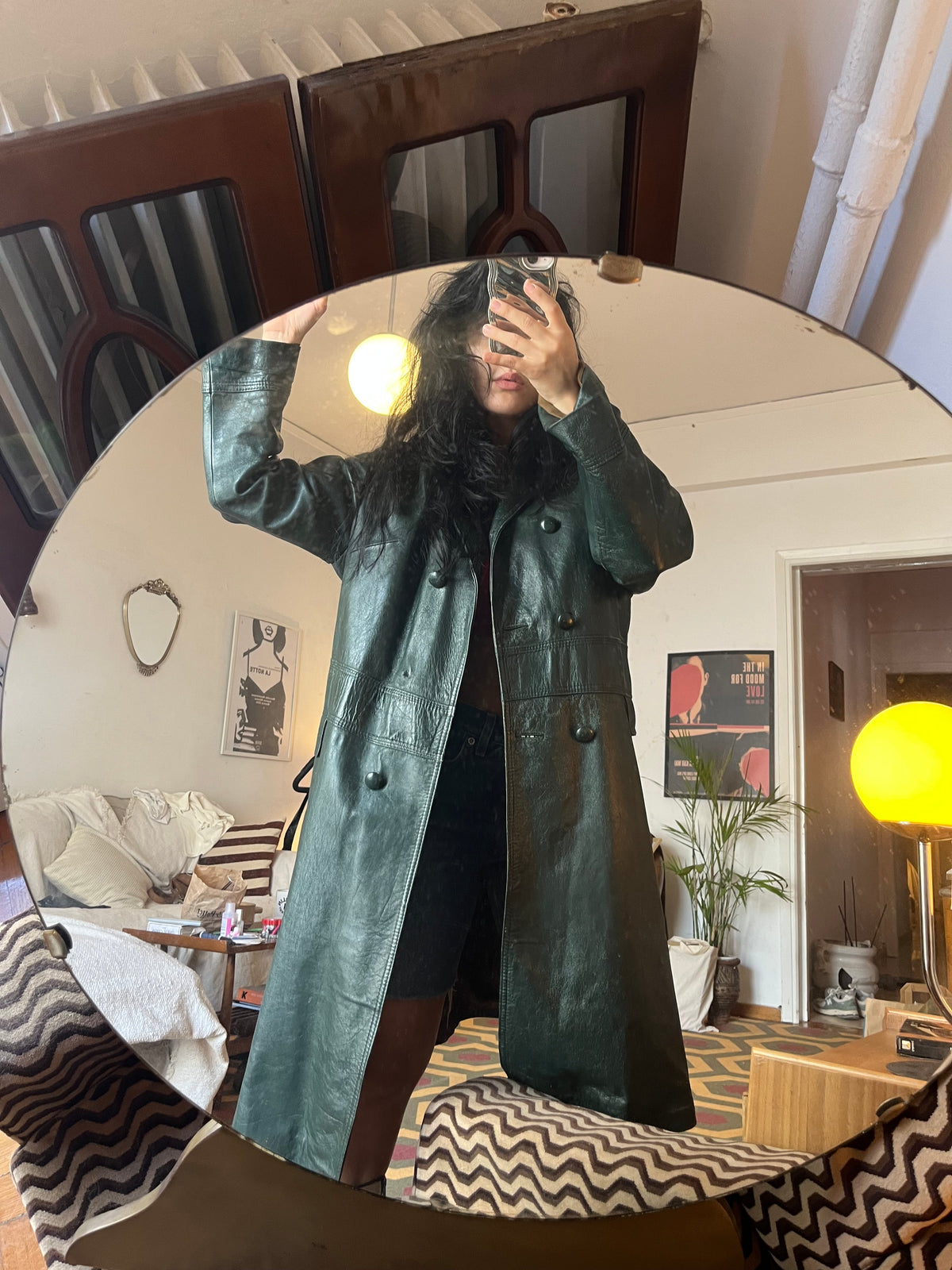Leather o’clock 🖤

Midi button-up coat in genuine leather, in a unique greenish-black shade.

Relaxed fit — best fits sizes S/M.