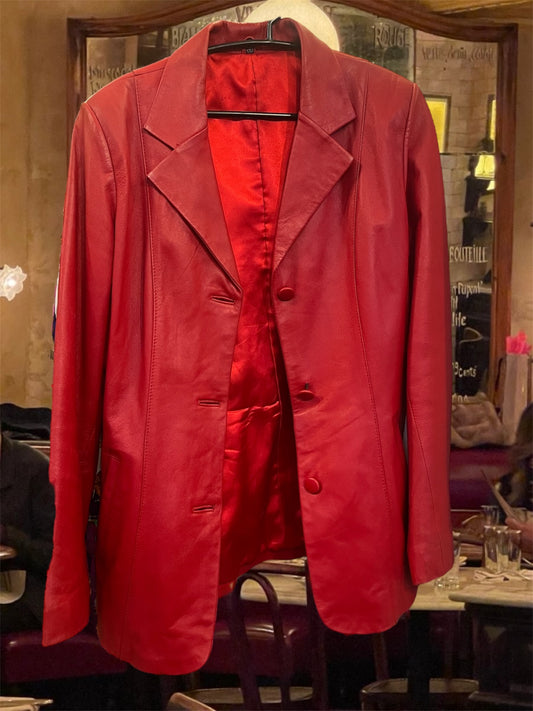 Genuine leather button up jacket in red .