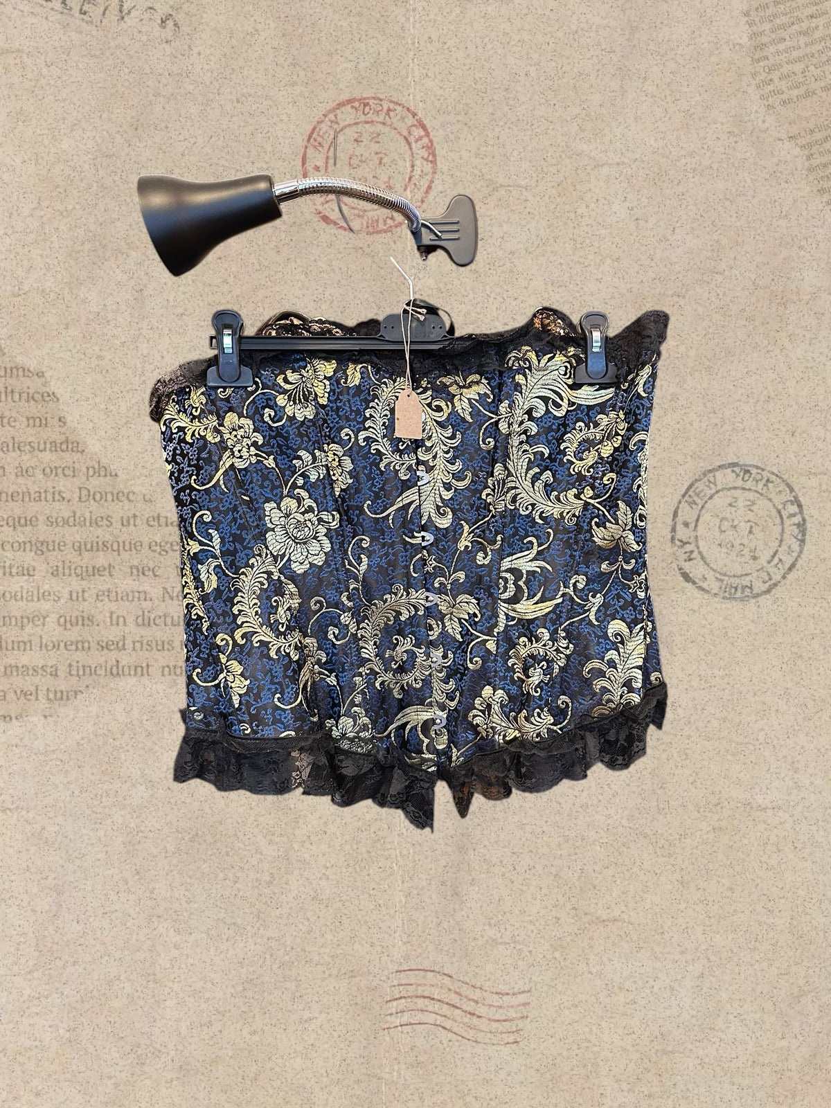 Victorian navy corset with gold brocade and black lace. Adjustable satin lace-up design. A timeless gothic statement piece