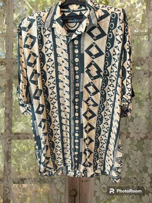 Boys patterned button up shirt .Fits best M/L