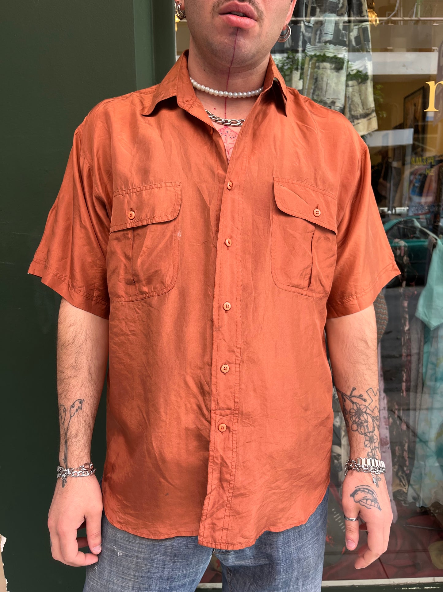 Silk orange button up shirt .Size L