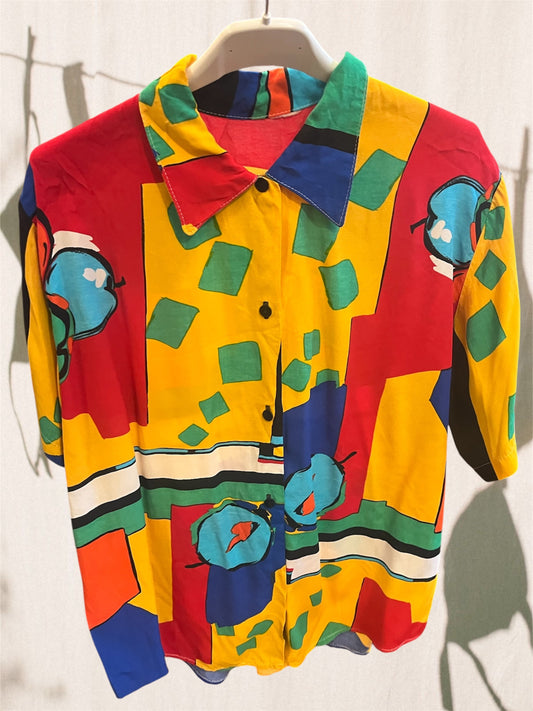 Funky button up shirt .Fits best S/M in relaxed fit