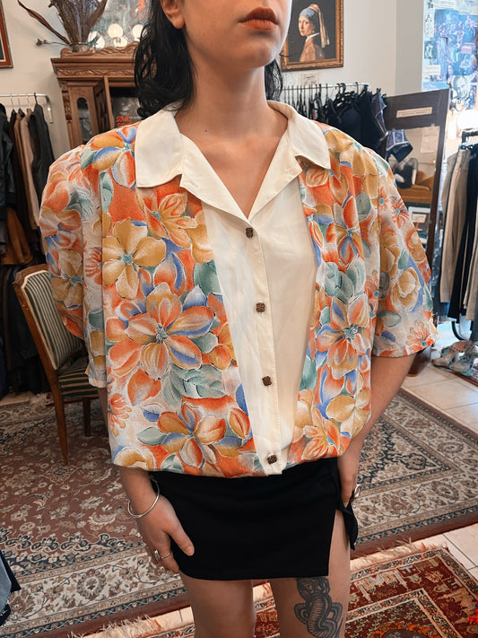Floral button up shirt .Size L